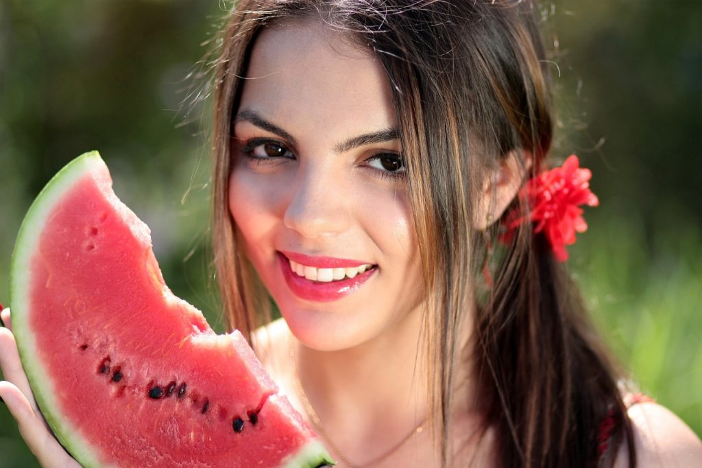 Woman Eating Watermelon.