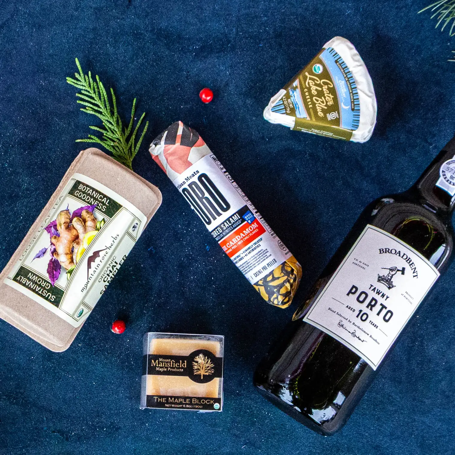 Holiday treats. Mountain Rose Herbs chai tea sampler, sustainably grown botanical goodness. Mansfield Maple Block, Coro Uncured Salami, Sage Cardamom flavor, Broadbent Tawny Porto Wine