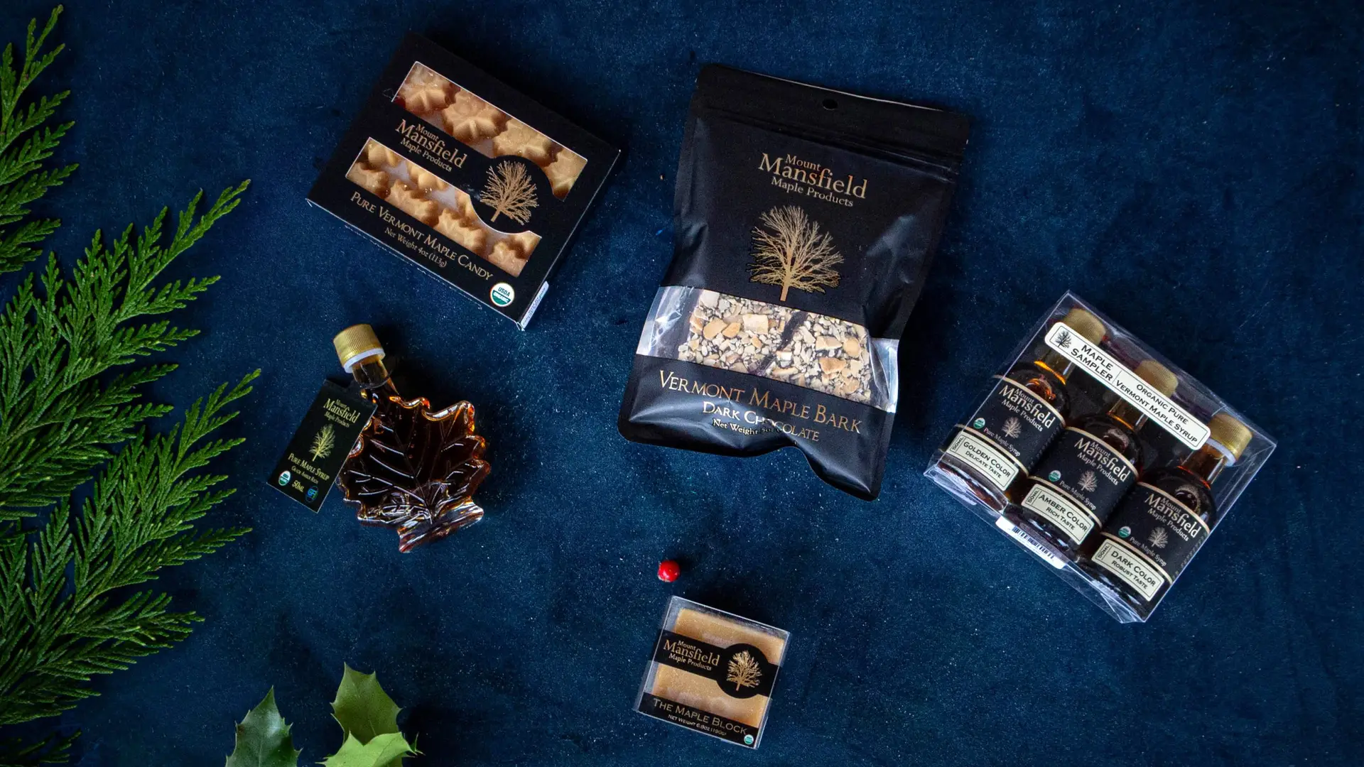 Organic Maple products from Mansfield Maple. Pure Vermont Organic Maple Candy, Vermont Maple Bark, dark chocolate flavor, Sampler set of maple syrups: Golden, Amber, Dark. Maple sugar block.