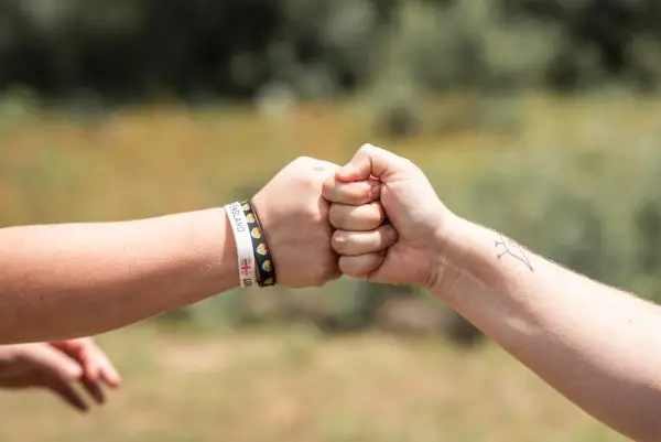 Salem Angels Dare to Dream Fist Bump