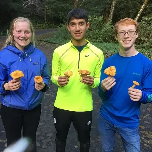 Salem Environmental Education teens in a park with mushrooms